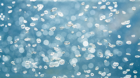 Background of under sea scape with air bubble and sun liight ray.Marine ,scuba,save the naturala water concept.の写真素材