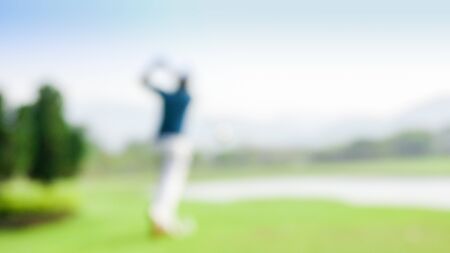 blur photograpy golf player during hit golf ball at beautifull tropical golf course .Healthy exercise golf game concept.の写真素材
