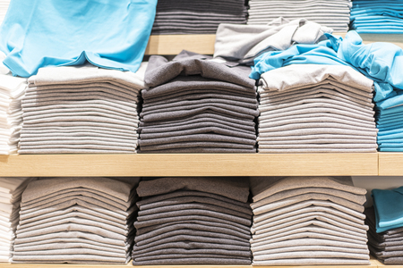 Color full stack of  t-shirt in shopping mall or department store.の写真素材