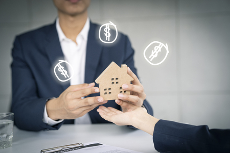 Civil engineer or architect hand over home to owner on working site ,Architect concept.の写真素材