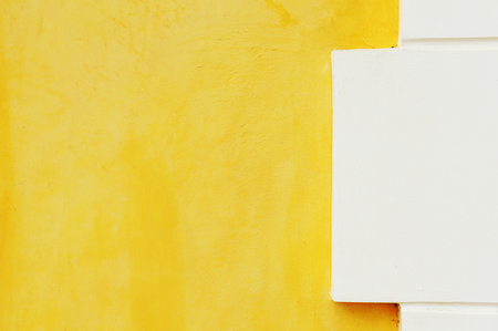 Yellow cement wall textureの写真素材