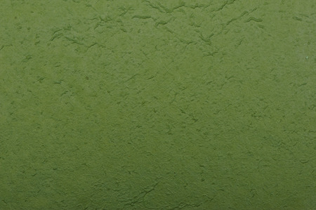 olive-green mulberry paper abstract backgroundの写真素材