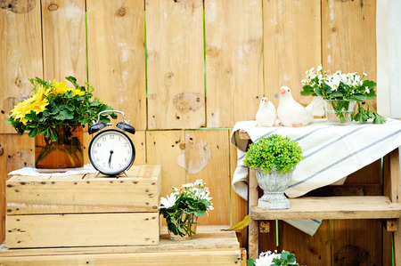 Old vintage alarm clock with bells,and old wooden backgroundの写真素材