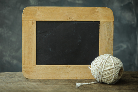 Blackboard on wood old wallの写真素材
