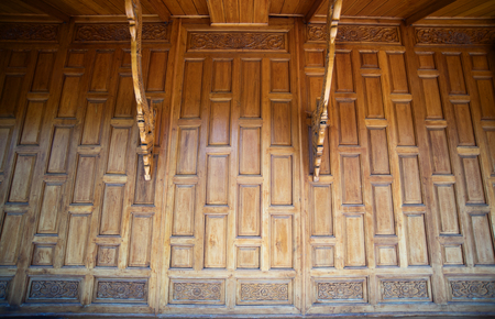 Thai traditional wooden wall backgroundの写真素材