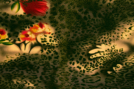 texture of print fabric striped leopard and flower for backgroundの写真素材