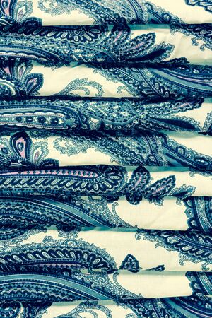 patterned fabric in with different foldsの写真素材