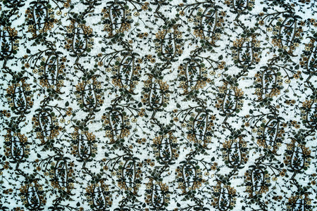 texture of vintage print fabric striped flowers and paisley for background