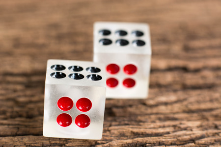 two dices on wood table