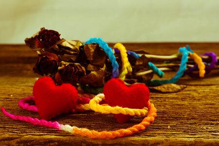 Valentines Day background with Red Hearts on old vintage wooden backgroundの写真素材