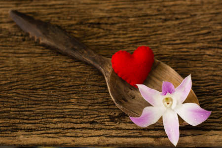 red hearts in wooden spoonの写真素材