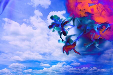 white fluffy clouds in the blue skyの写真素材