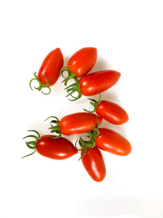 Red cherry tomatoes on a white background. Cherry tomatoes on a white background.の写真素材