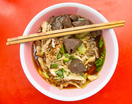 A bowl of chicken noodle for lunch in Thai style.の写真素材