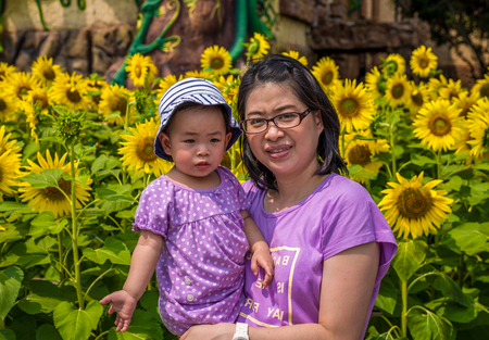 Pathumthani, Thailand - Mar 8 , 2015: Unidentified mother and daughter at Dream World Theme Park.のeditorial素材