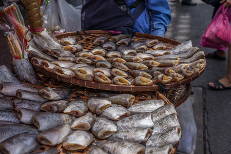 Sun burn fish for sell on street of Bangkokの写真素材