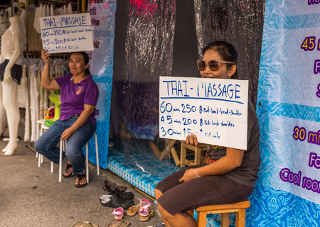 Bangkok, Thailand - Nov 7, 2015 Unidentified woman is calling for customer to massage at Chatuchak, the biggest weekend market in South East Asia.のeditorial素材