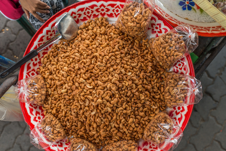 Bangkok, Thailand - Nov 14, 2015 Cashew nut in the bag for sell on sidewalk at Chatuchak, the biggest weekend market in South East Asia.のeditorial素材