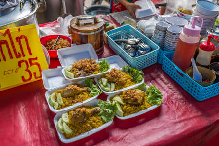 Bangkok, Thailand - Nov 14, 2015 Chicken rice curry in pack for sell at Chatuchak, the biggest weekend market in South East Asia.のeditorial素材