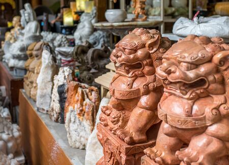 Bangkok, Thailand - Nov 7, 2015 Stone Lion and others in Chinese art for sell  at Chatuchak, the biggest weekend market in South East Asia.のeditorial素材