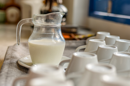One jug of milk on a counter in resturantの写真素材