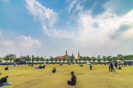 Bangkok, Thailand - Oct 18, 2016 Unidentified people are waiting to see the Royal Family that come to pray for The King IV at Sanam Luang in front of Wat Phra Kaew and the Grand Palaceのeditorial素材