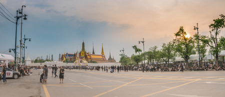Bangkok, Thailand - Oct 18, 2016 Unidentified people are waiting to see the Royal Family that come to pray for The King IV at Sanam Luang in front of Wat Phra Kaew and the Grand Palaceのeditorial素材