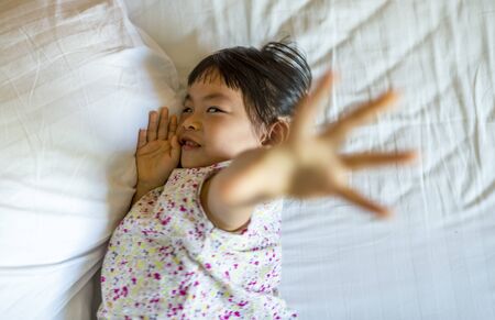 Thai-Chinese little girl in 3.5 years old in happy time.の写真素材
