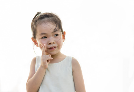 Asian little girl in action. She is 3.5 years oldの写真素材