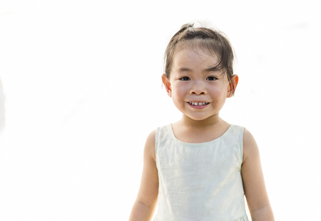 Asian little girl in smiling face. She is 3.5 years oldの写真素材
