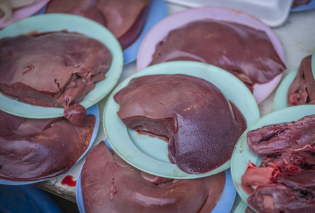 Animal organs on street fresh food market of Thailandの写真素材