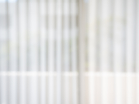Blurred background image of white curtain in a hospital.の写真素材