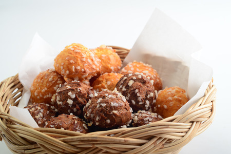 Baked dough ball in basket on white backgroundの写真素材