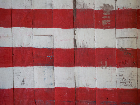 Background painted wood plank wall, red and white.の写真素材