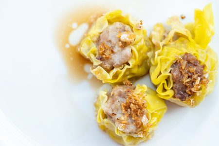 Close up homemade Dumpling Dim Sum on white plate.の写真素材