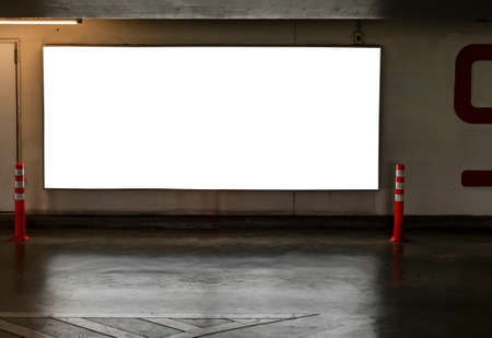 Blank horizontal digital banner for advertising, big digital blank banner on wall of car park in shopping mall building.の写真素材