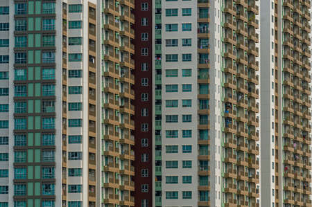Beautiful pattern from many windows and balconies apartment building, Exterior building facade of...