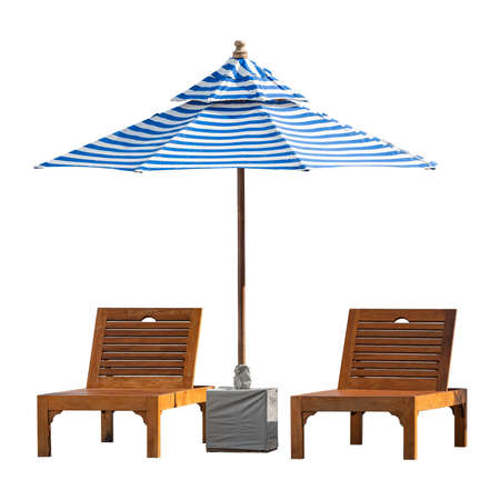 Isolated two wooden chairs or beach chair or sun bed with big umbrella on white background, front view image, small water drops on umbrella.の写真素材