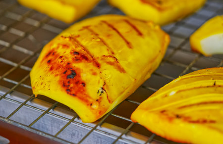 Close up burning marks on grilled squid, marinaded grilled squid of Thai food.の写真素材