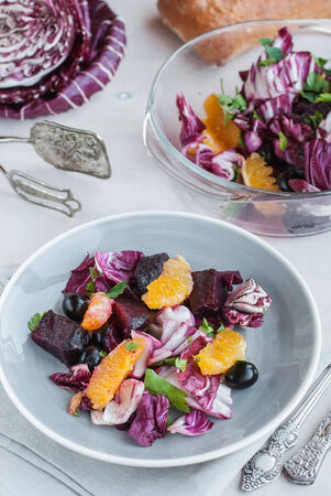 Fresh beet, orange, radicchio, black olives salad. Selective focusの写真素材