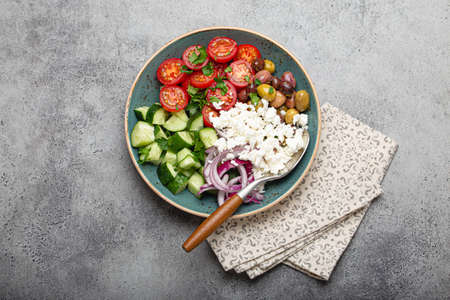 Greek salad with vegetables and feta cheese from aboveの写真素材
