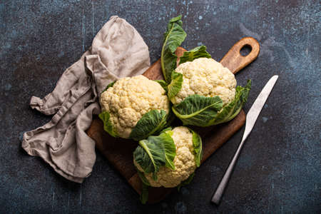 Fresh raw cut cauliflower with knifeの写真素材