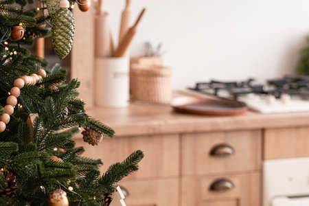 Christmas tree close-up on kitchen copy spaceの写真素材