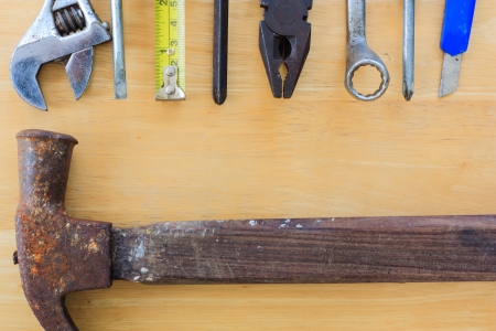 the old group of tool set on wood background
