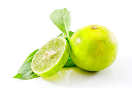 fresh limes on white background