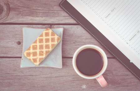 coffee cup on table with cake : vintage styleの写真素材