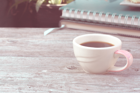 coffee cup on table with cake : vintage styleの写真素材