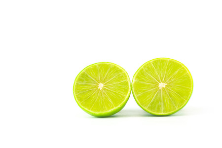 limes isolated on white backgroundの写真素材