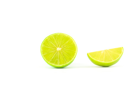 limes isolated on white backgroundの写真素材