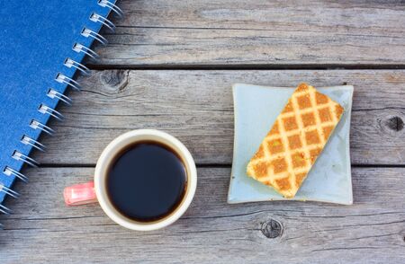 coffee cup on table with cakeの写真素材